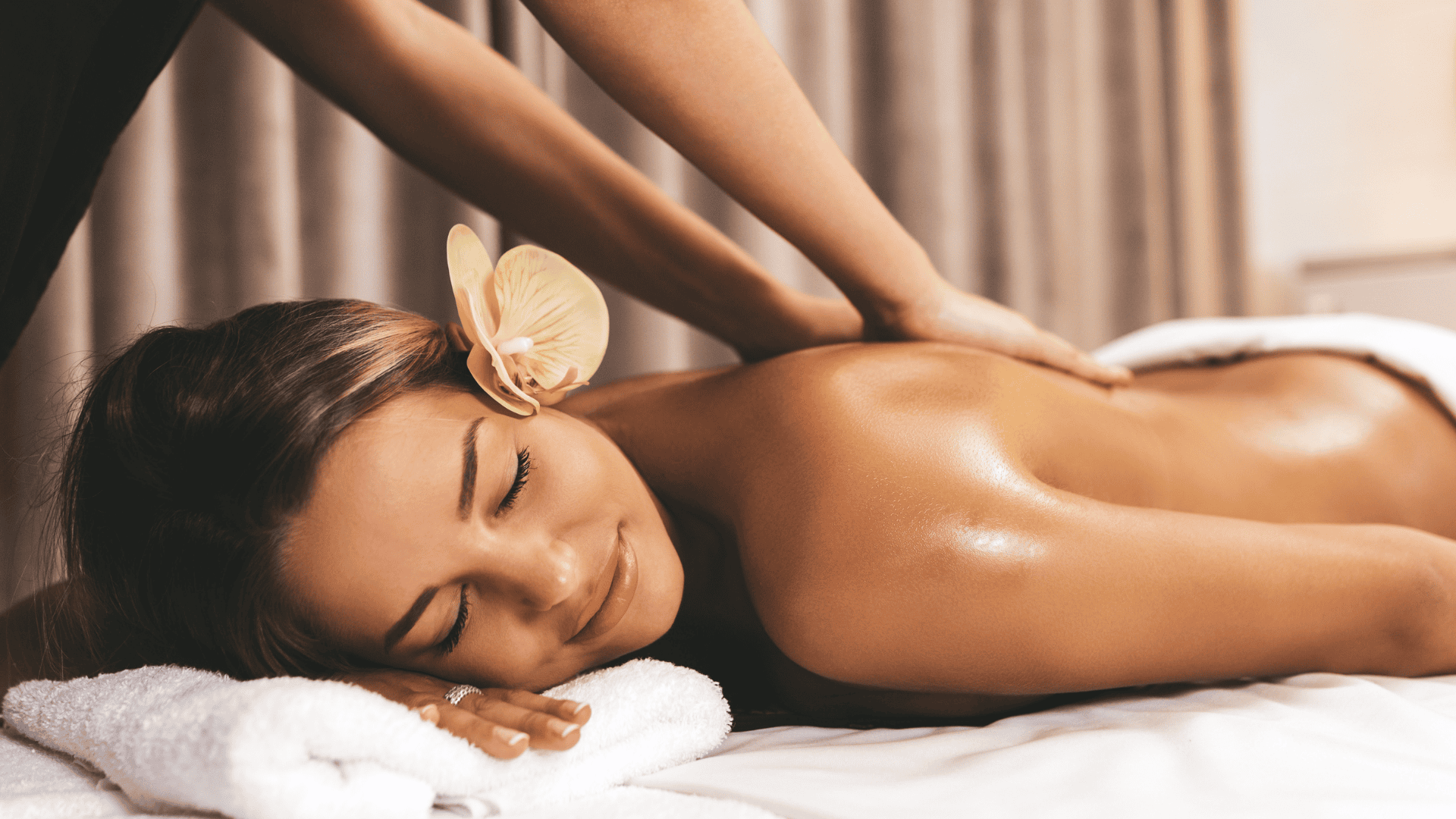 a woman lying on a bed