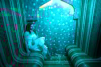 a person sitting on a staircase