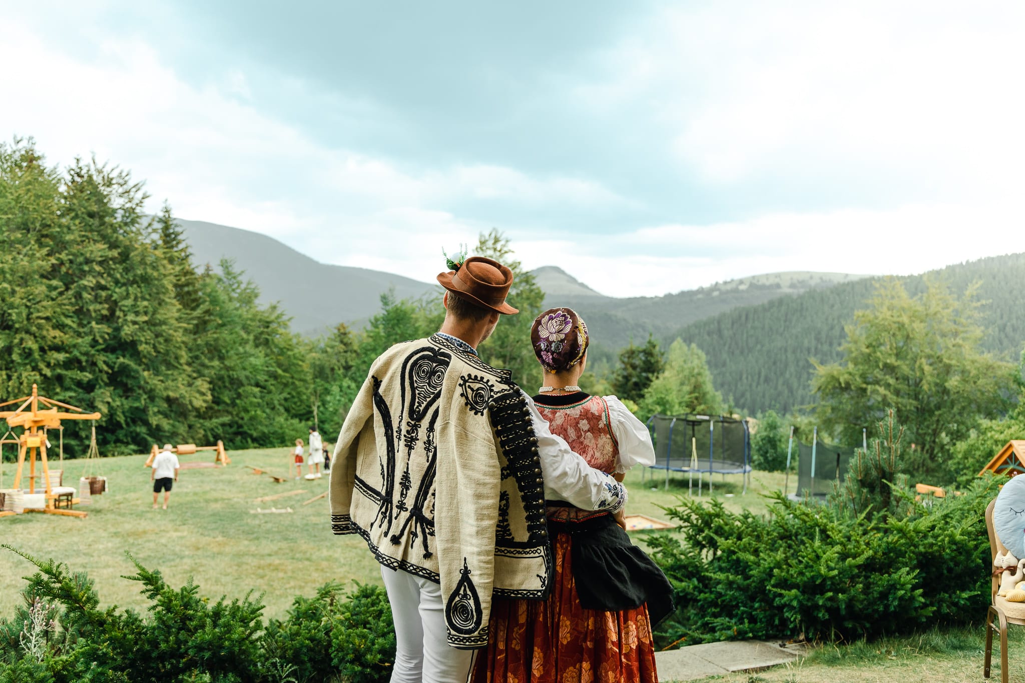 a man and woman holding each other