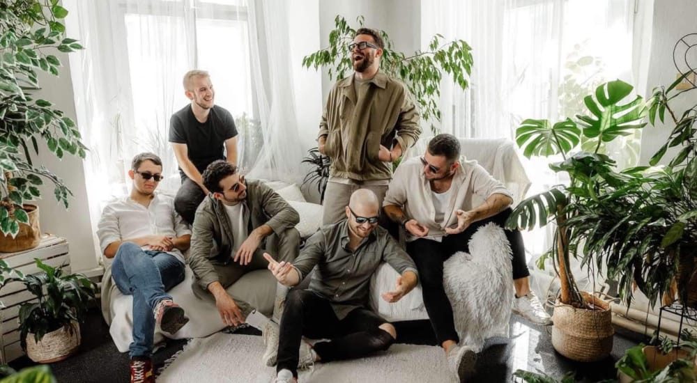 a group of people sitting on a couch