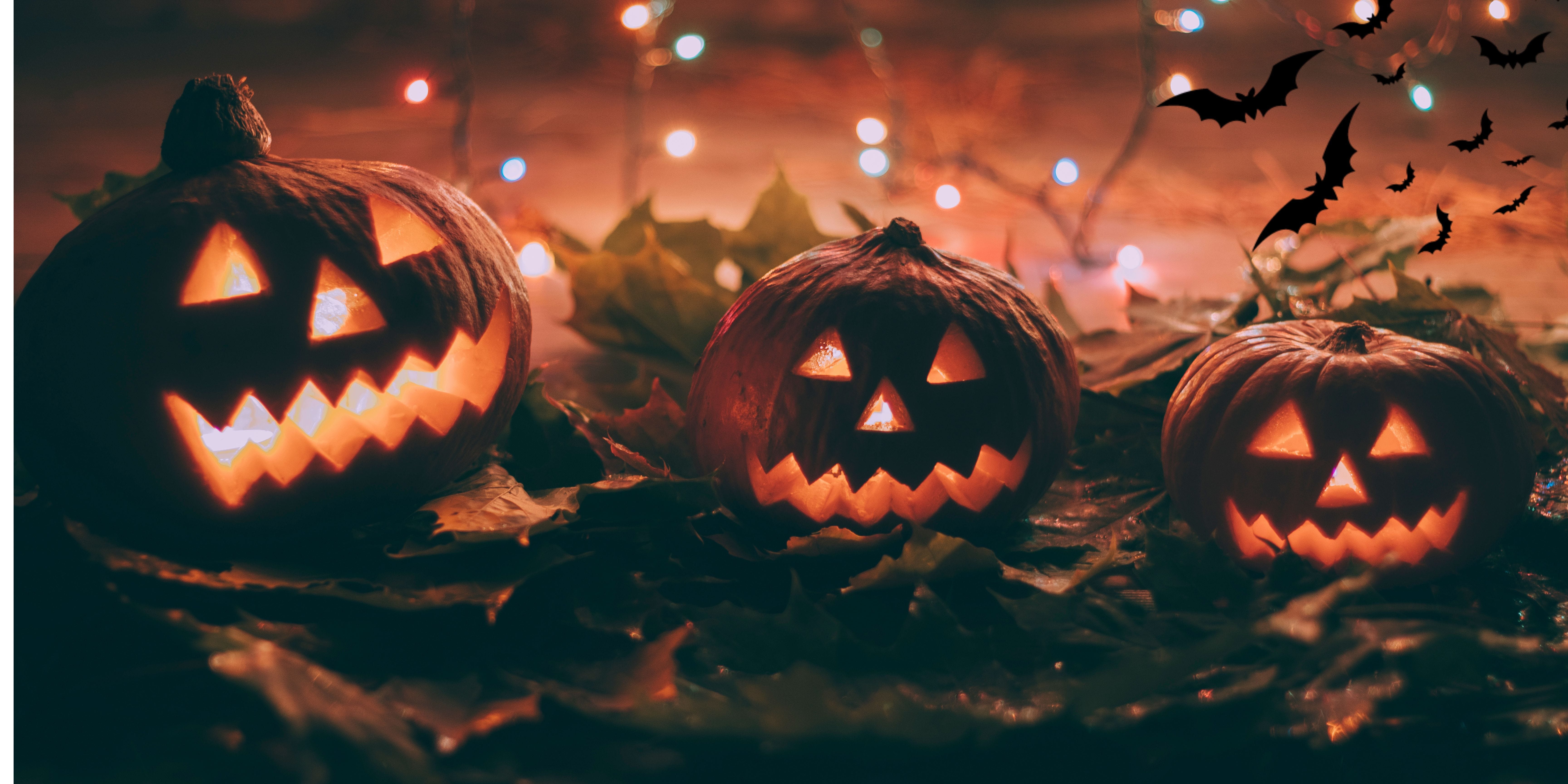 a group of carved pumpkins