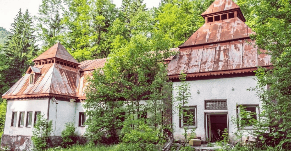 a white house with a red roof