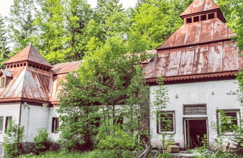 a white house with a red roof