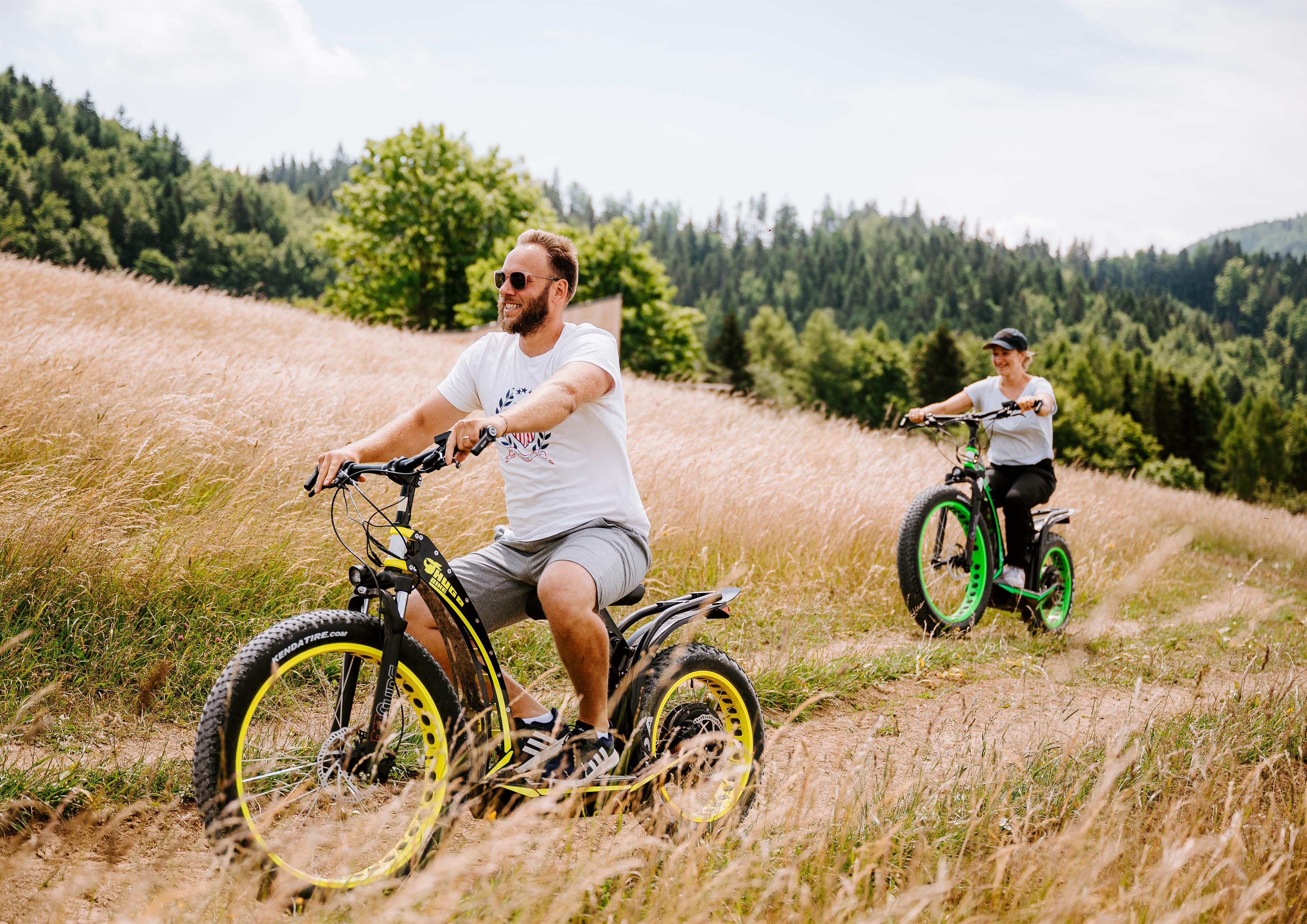 a man and a boy riding bikes