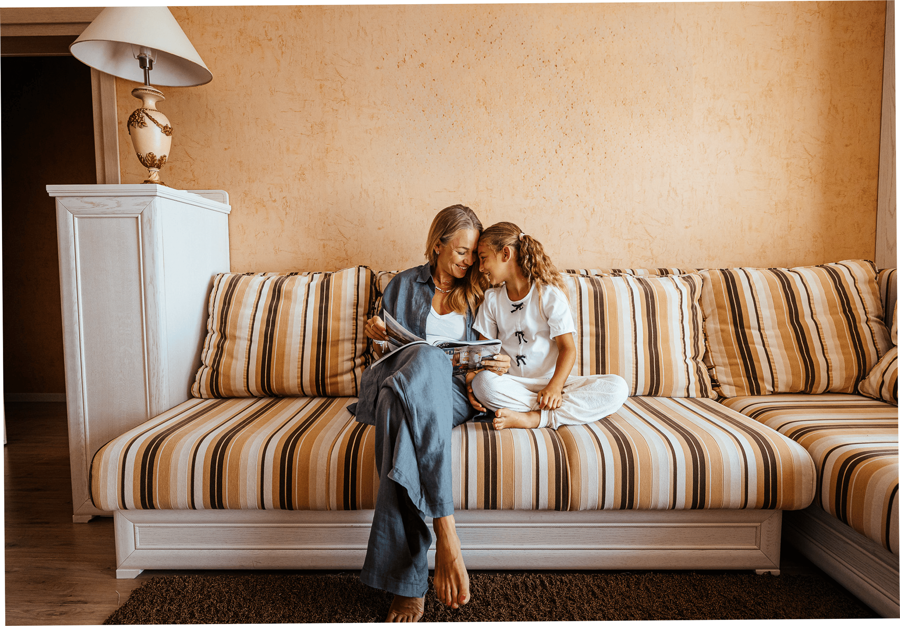 a person and a child on a couch