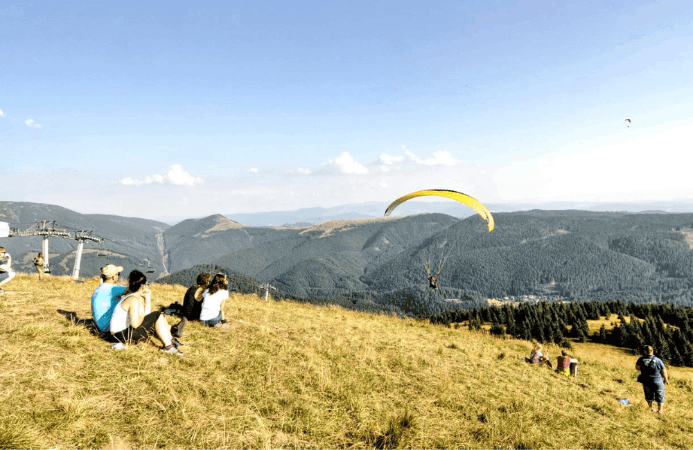 a group of people parachuting