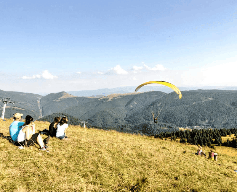 a group of people parachuting