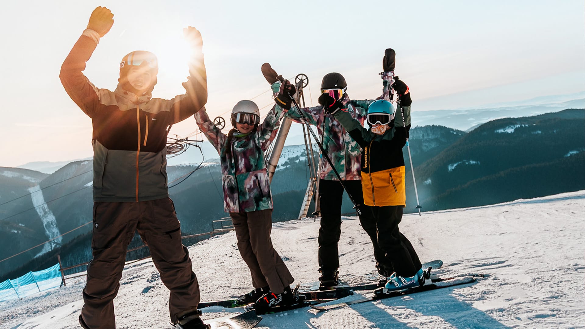a group of people on skis posing for a photo