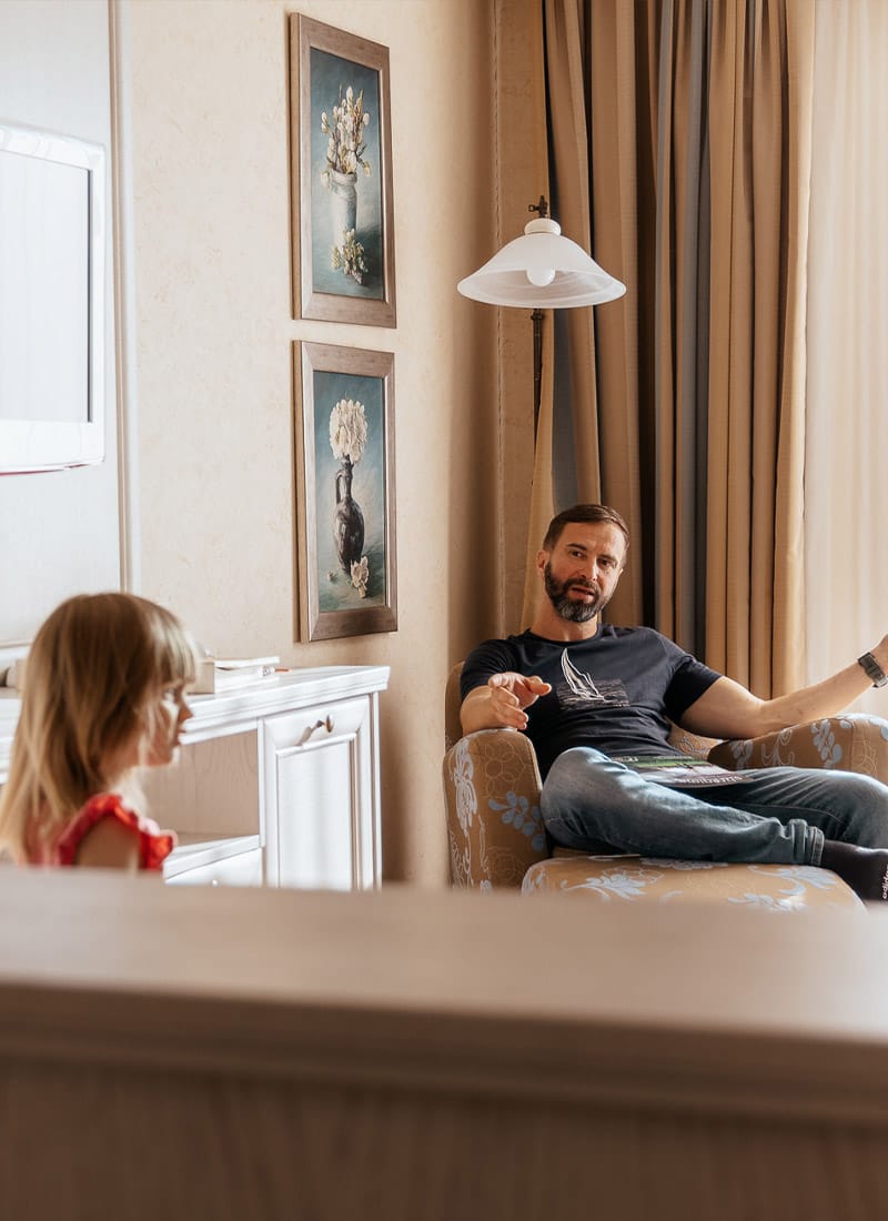 a man and a woman sitting on a couch