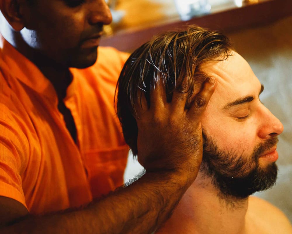 a man with his head in his hand