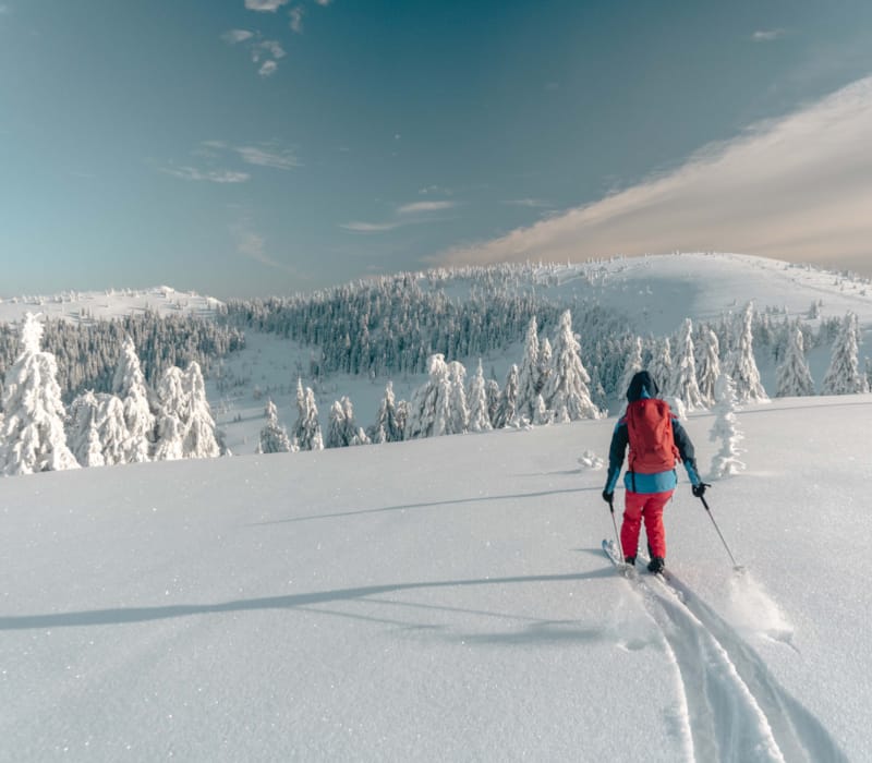 a person skiing on the snow