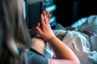 a person holding the hands up