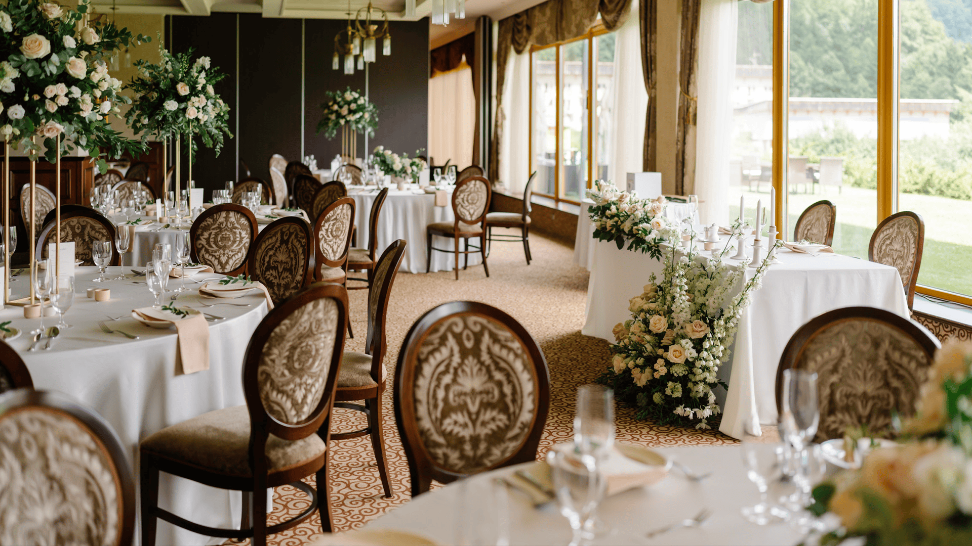 a room with tables and chairs