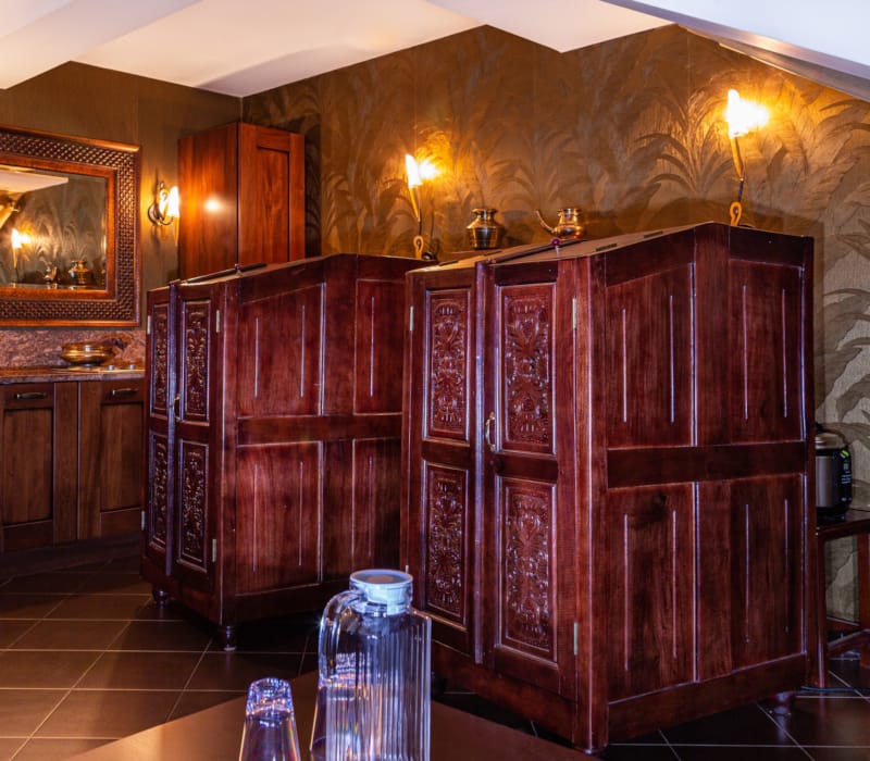 a room with a wood cabinet