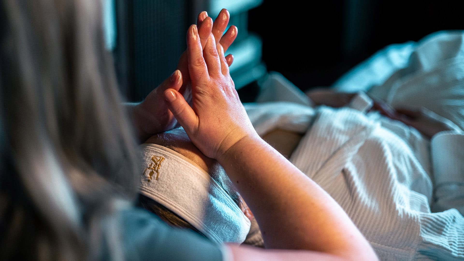 a person's feet on a bed