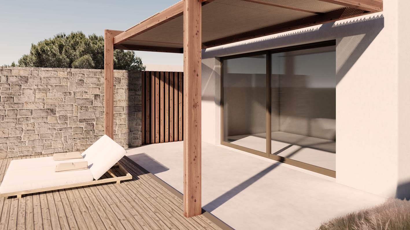 a deck with a wood door and a glass wall