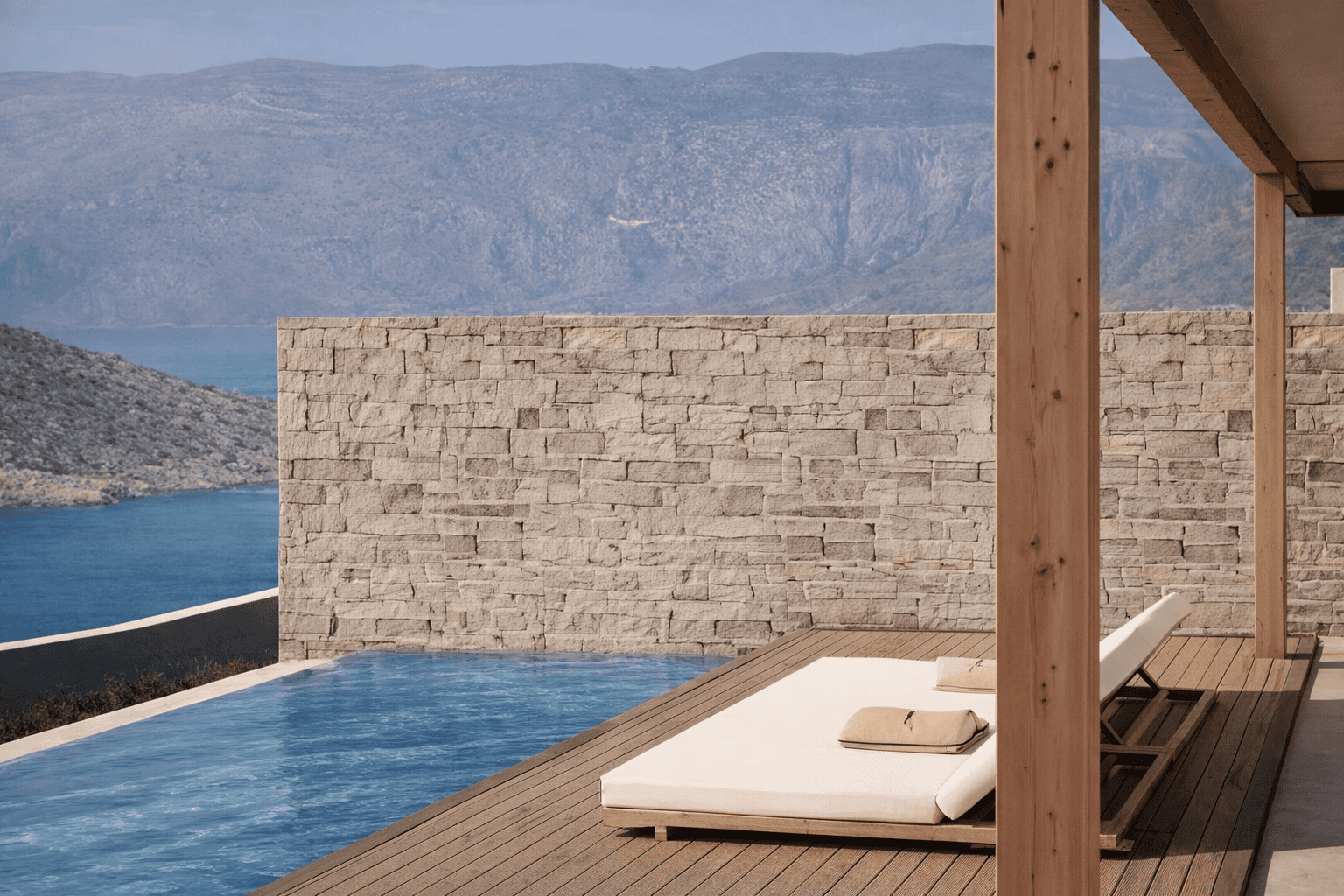 a table and chairs by a pool