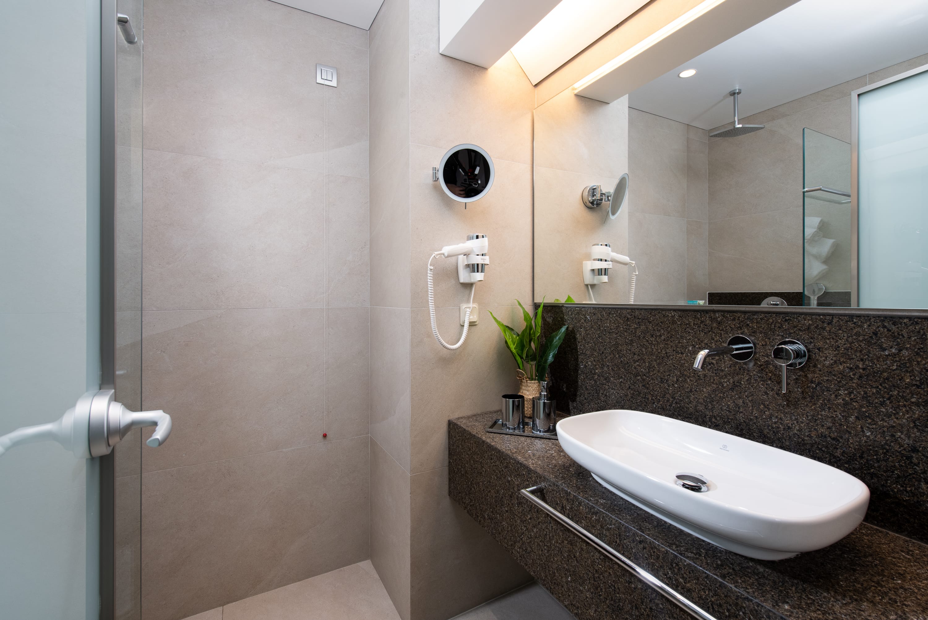 a bathroom with a large mirror