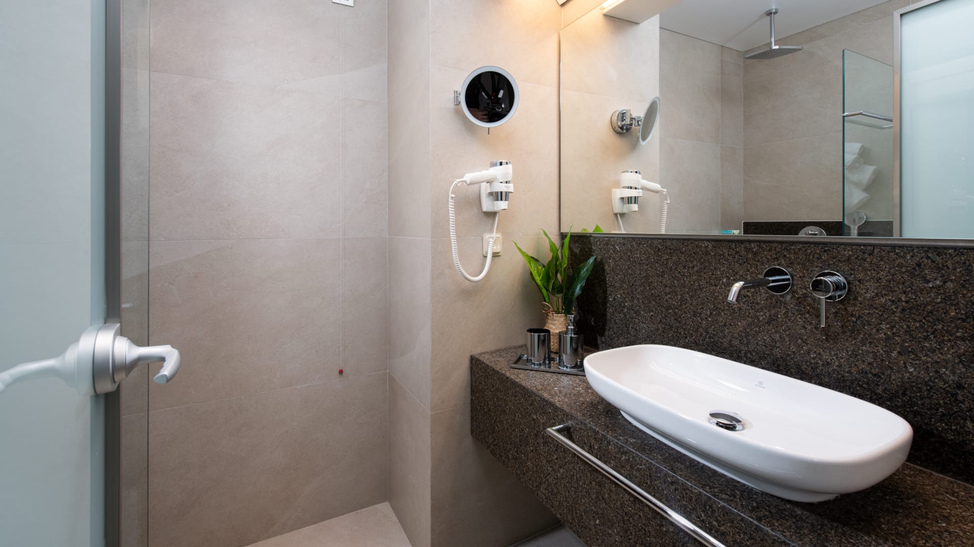 a bathroom with a large mirror