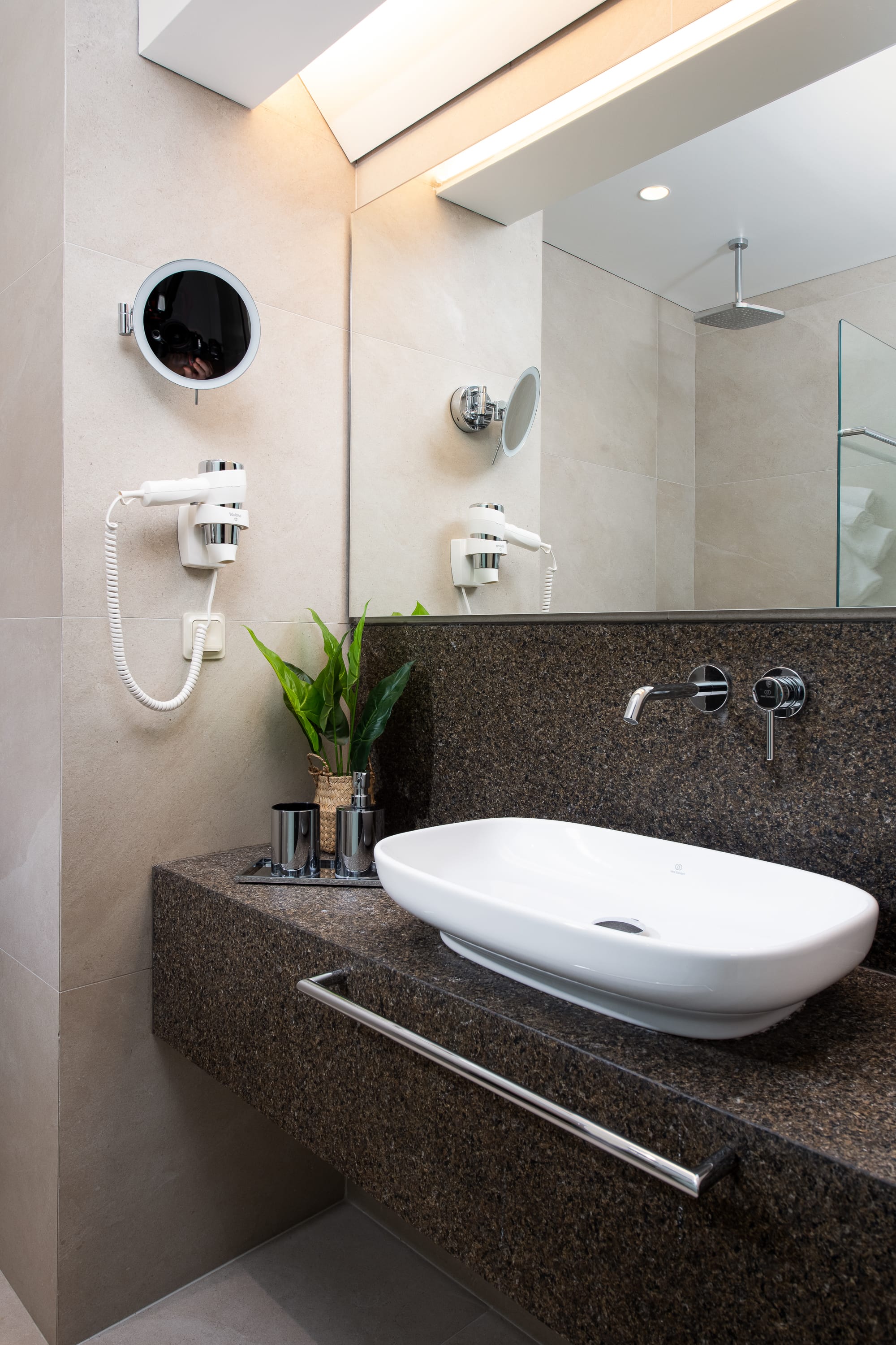 a bathroom with a large mirror