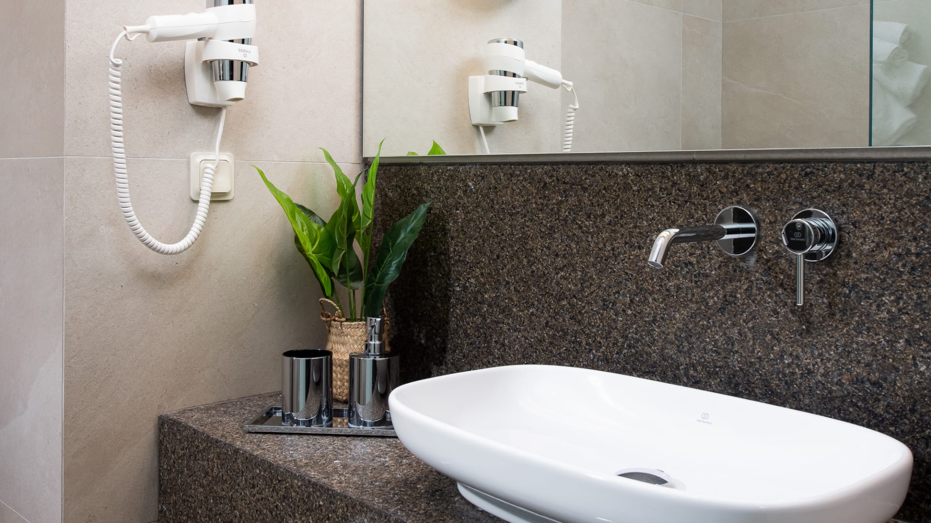 a bathroom with a large mirror