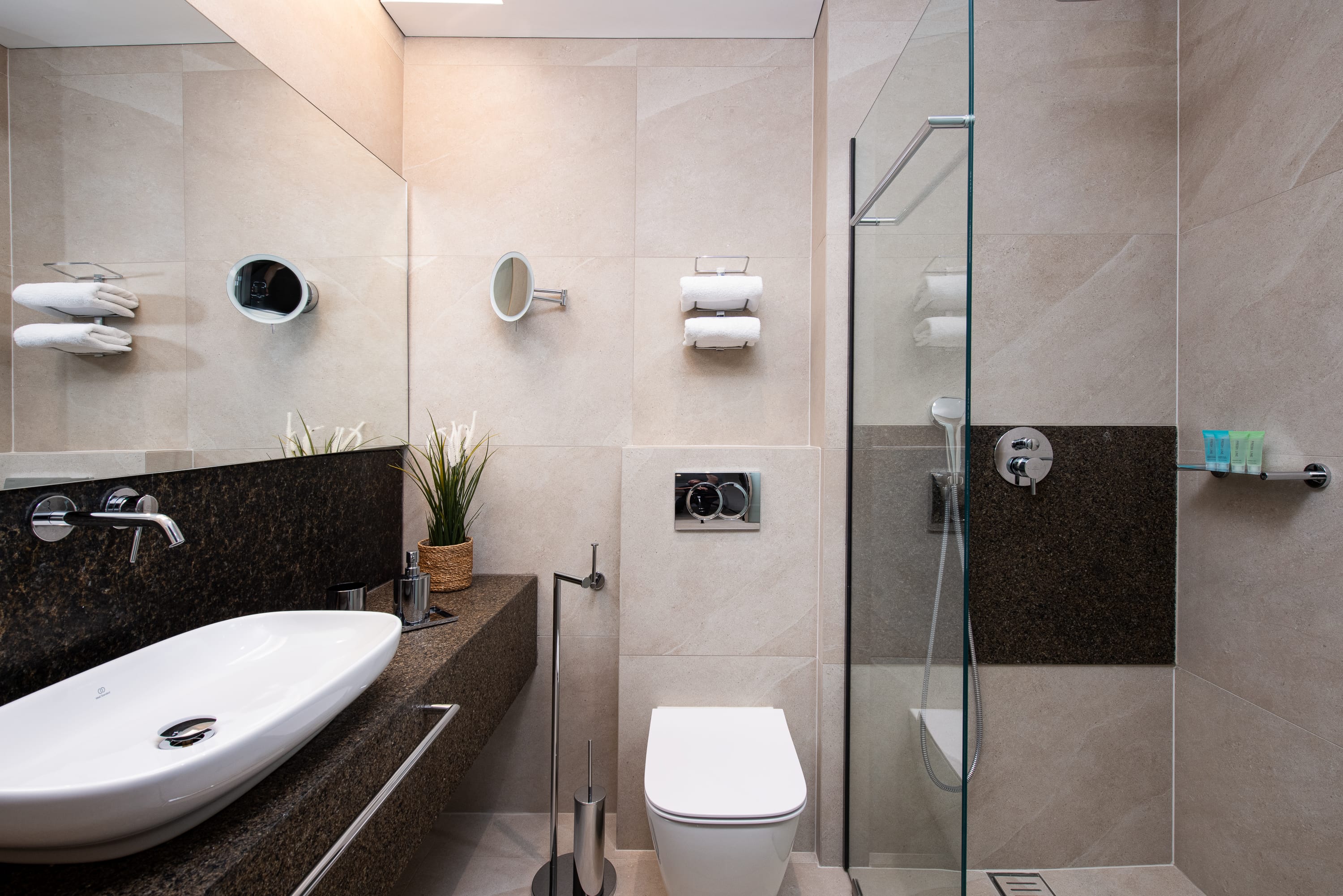 a bathroom with a glass shower