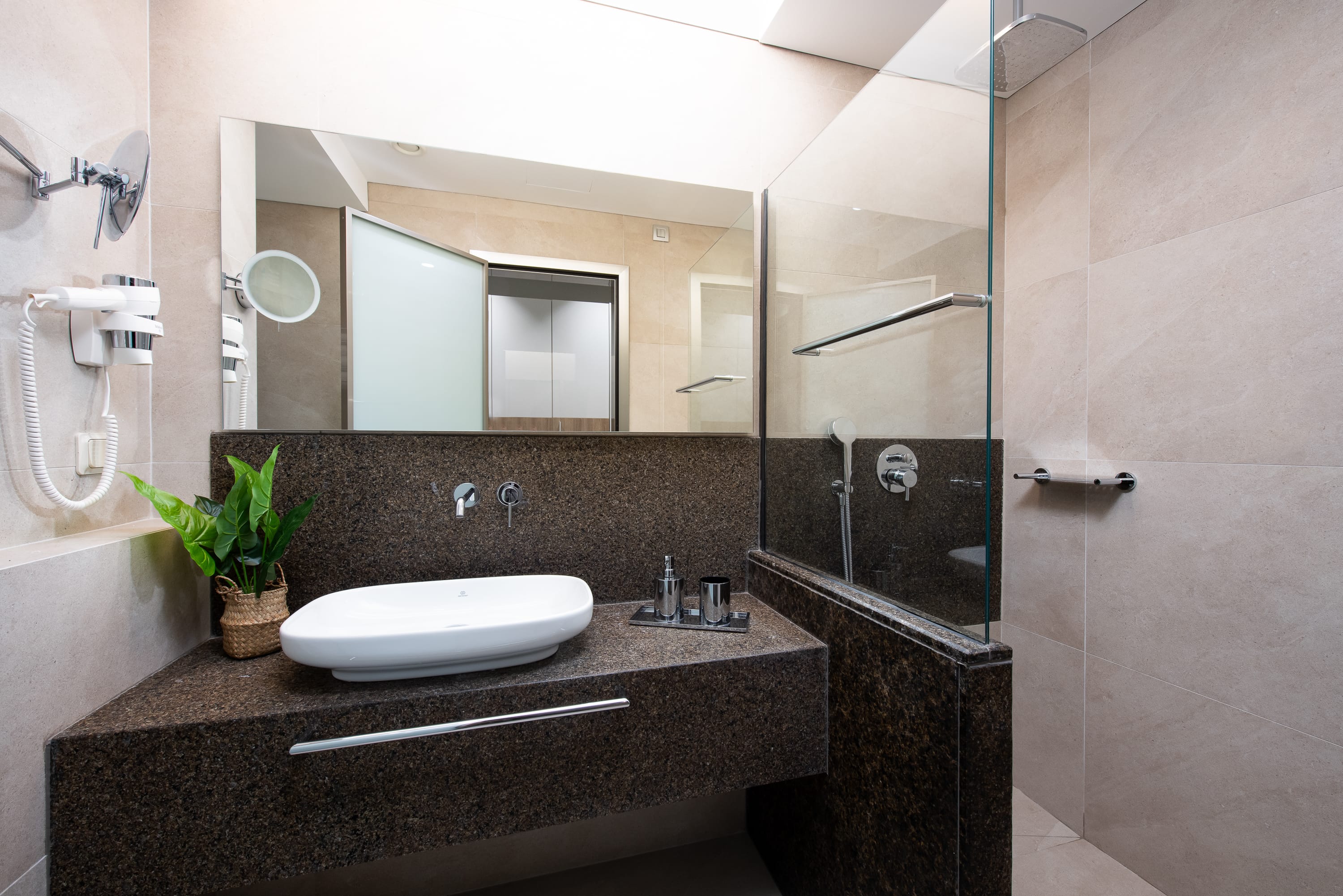 a bathroom with a large mirror