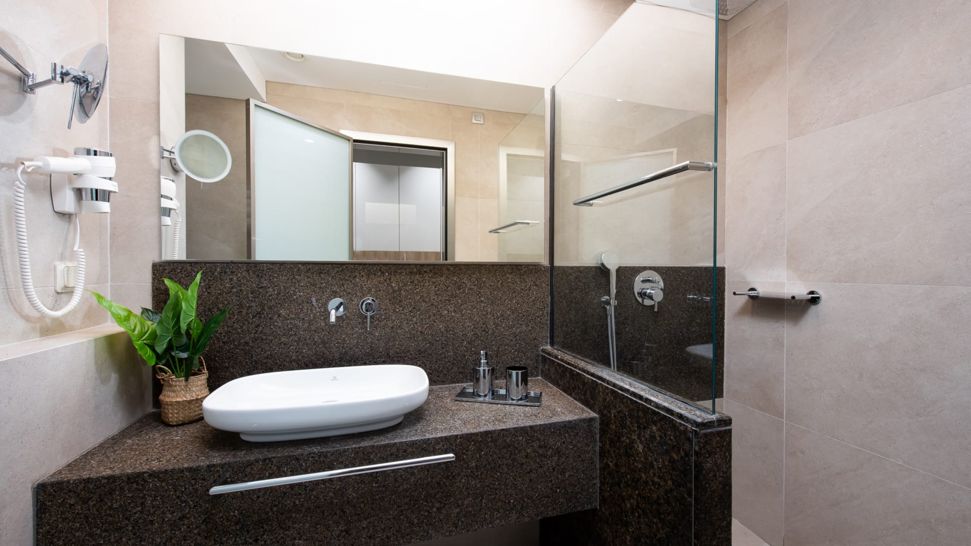 a bathroom with a large mirror