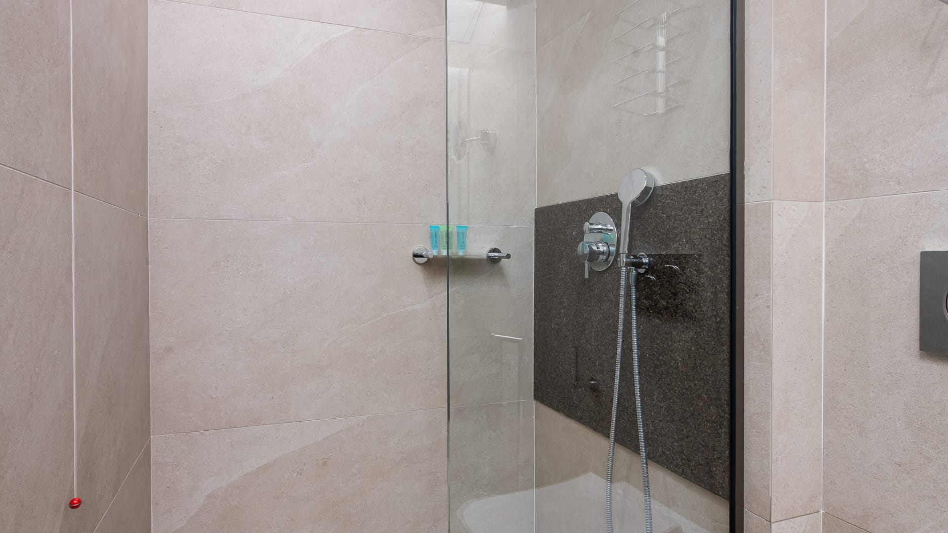 a shower with a glass door