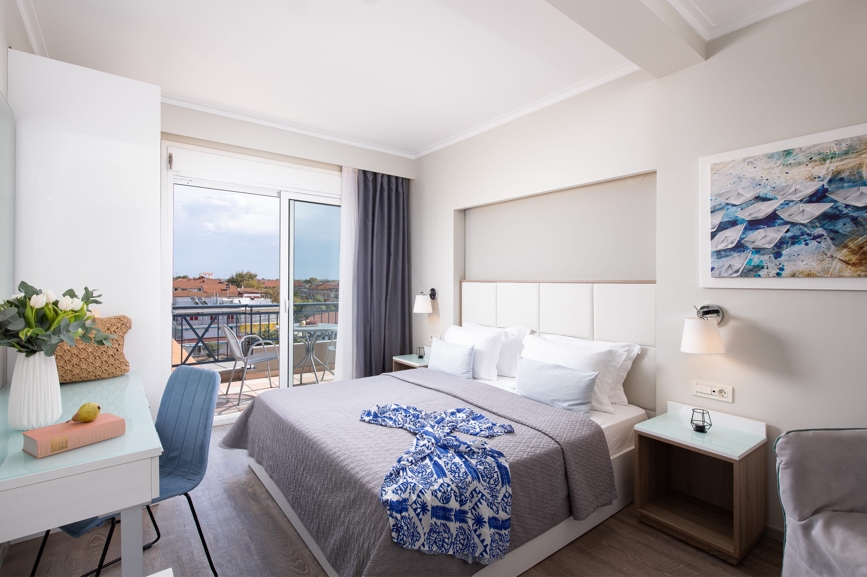 a bedroom with a large window