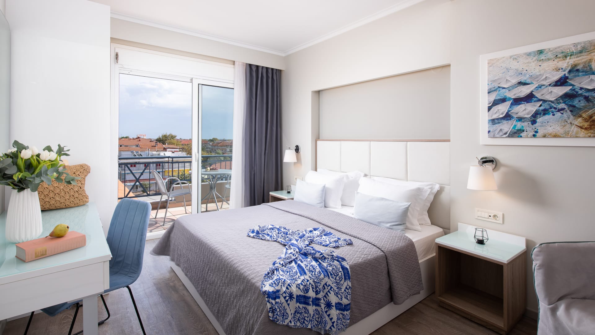 a bedroom with a large window
