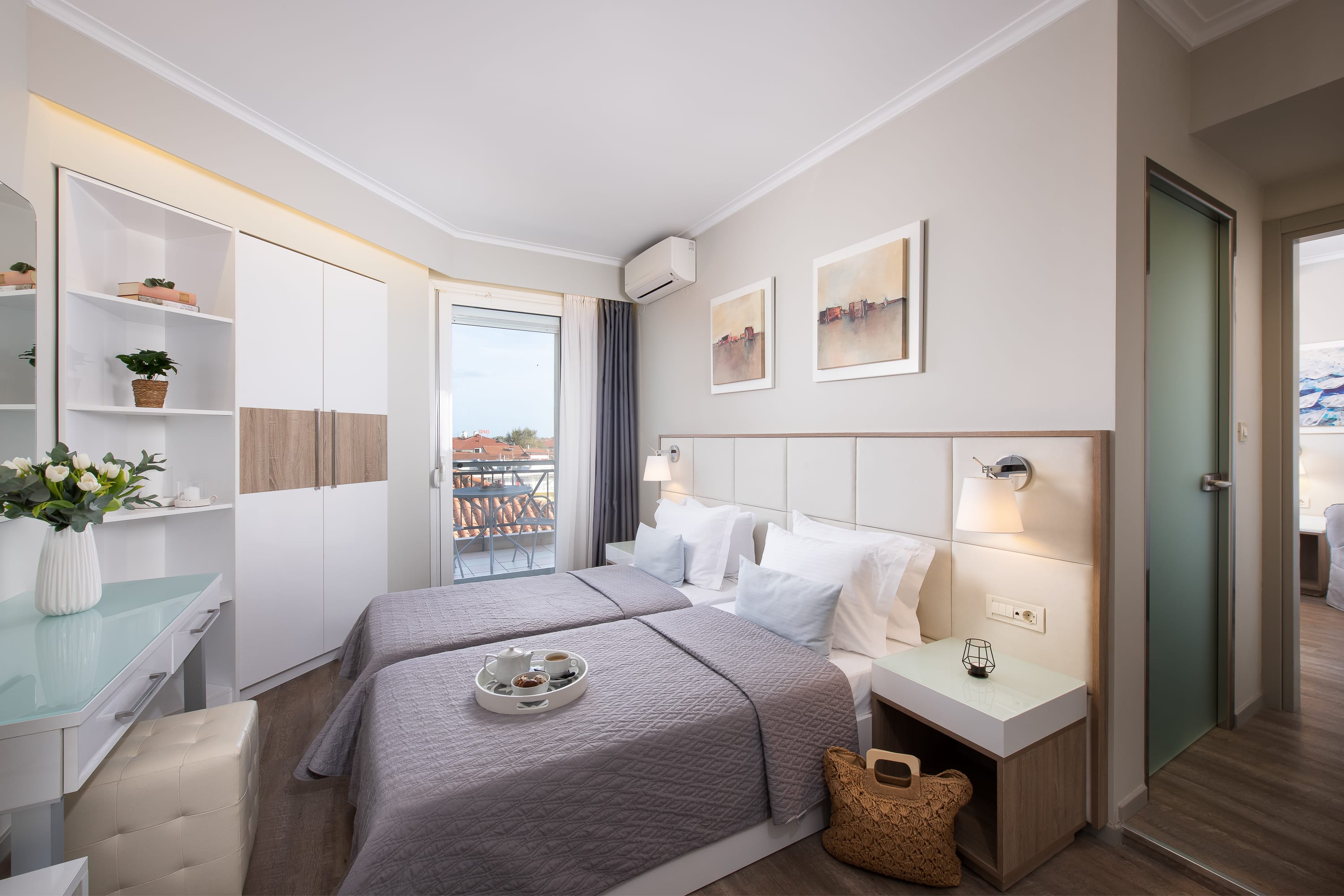 a bedroom with a bed and a shelf with a basket on it