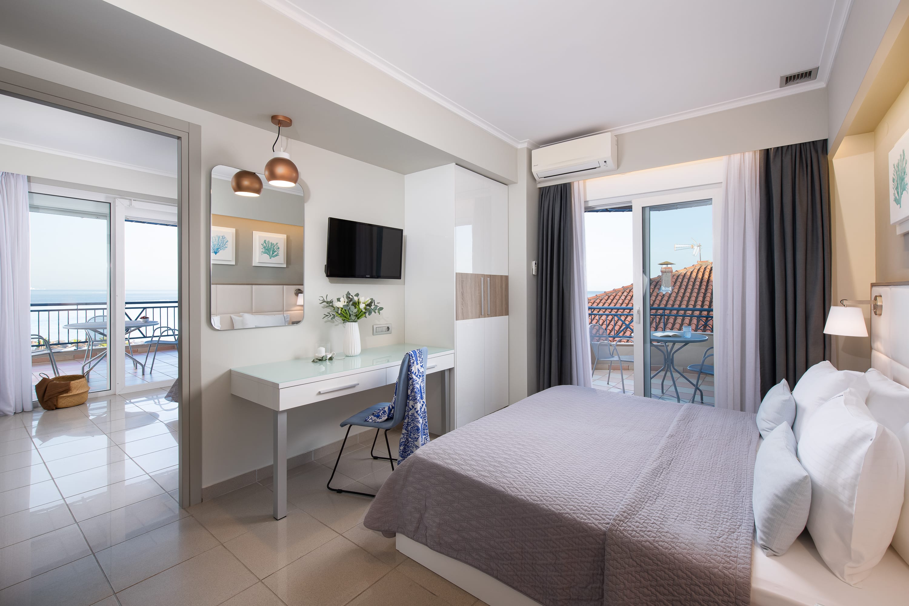 a bedroom with a bed and a desk