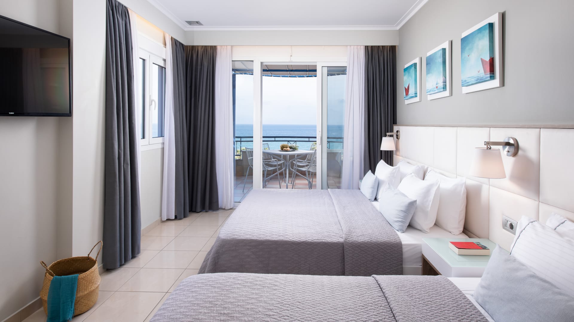 a hotel room with a large glass door