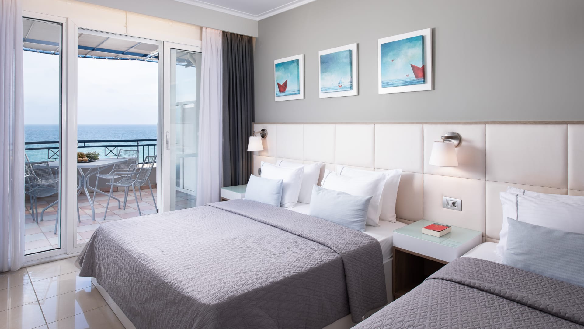 a bedroom with a large glass door