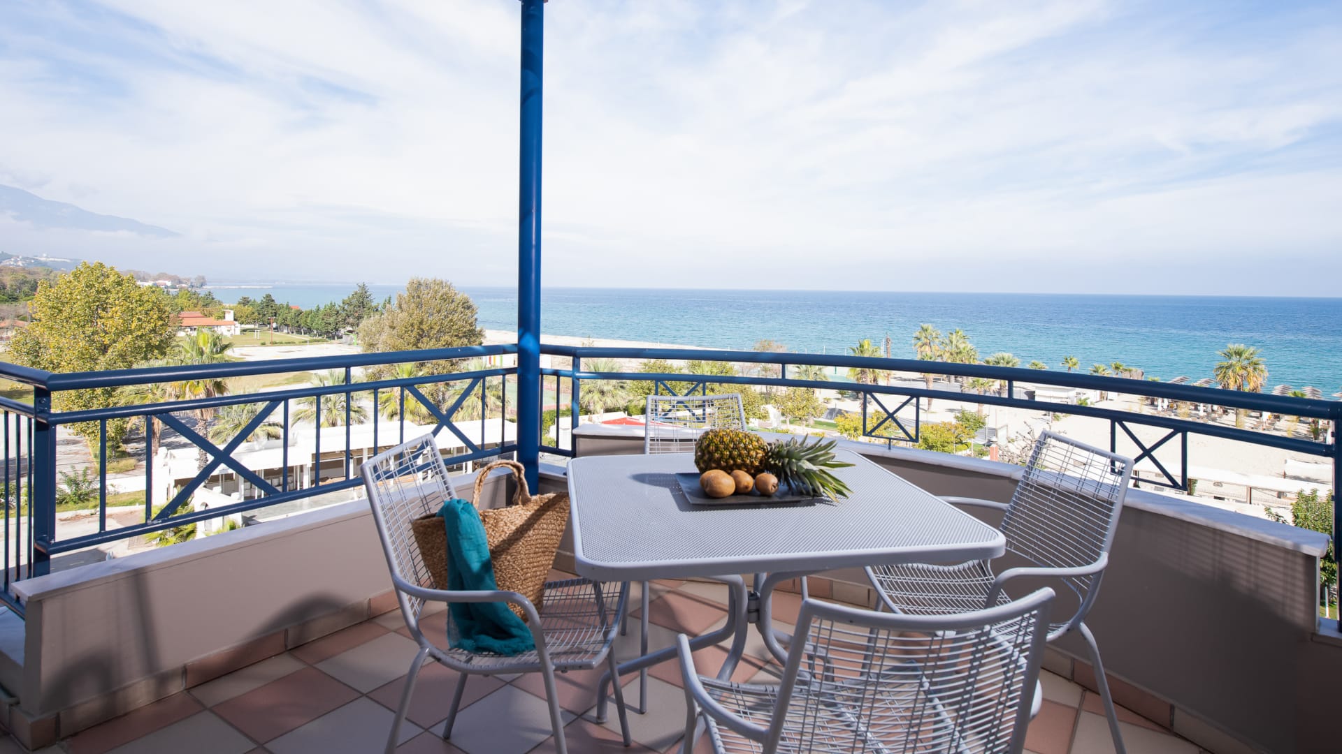 a table and chairs on a deck