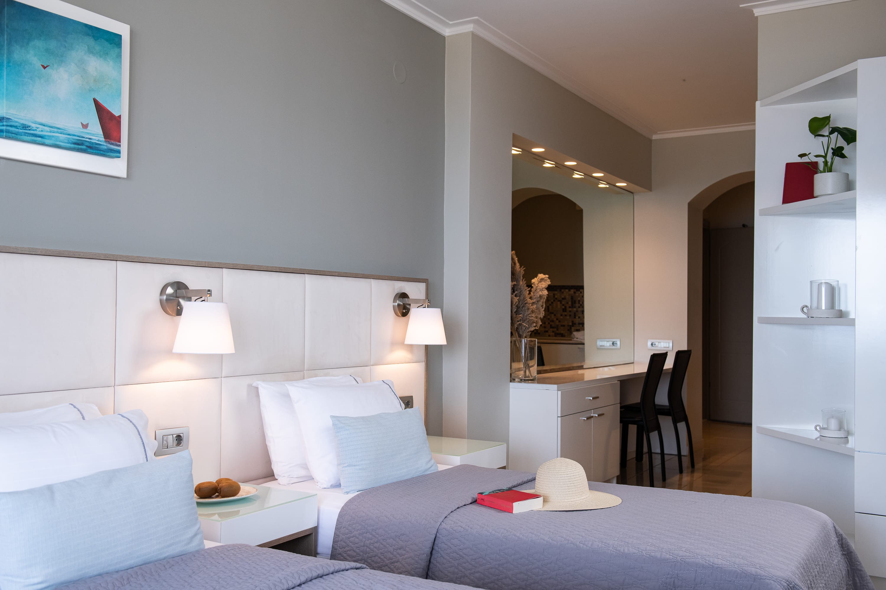 a bedroom with a bed and a desk