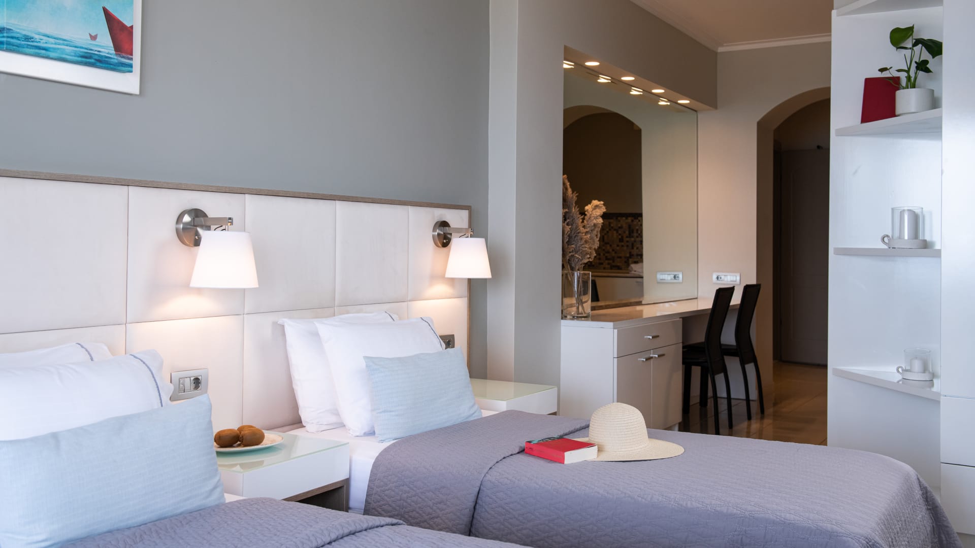 a bedroom with a bed and a desk