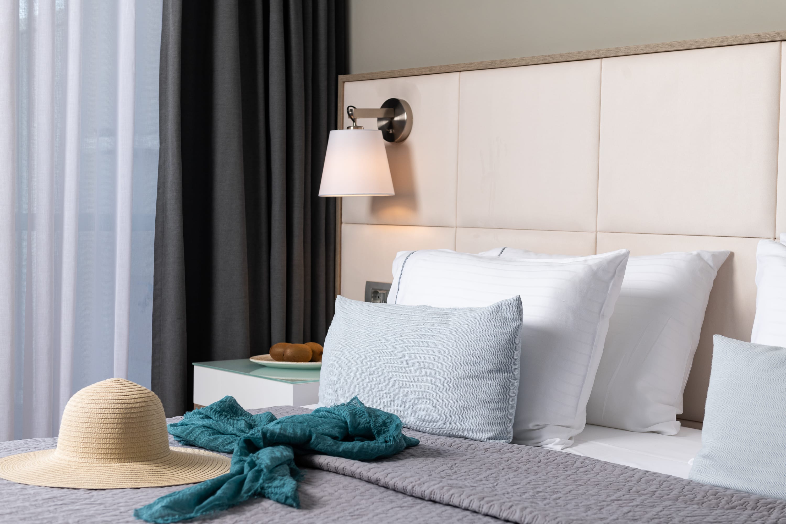 a bed with white pillows