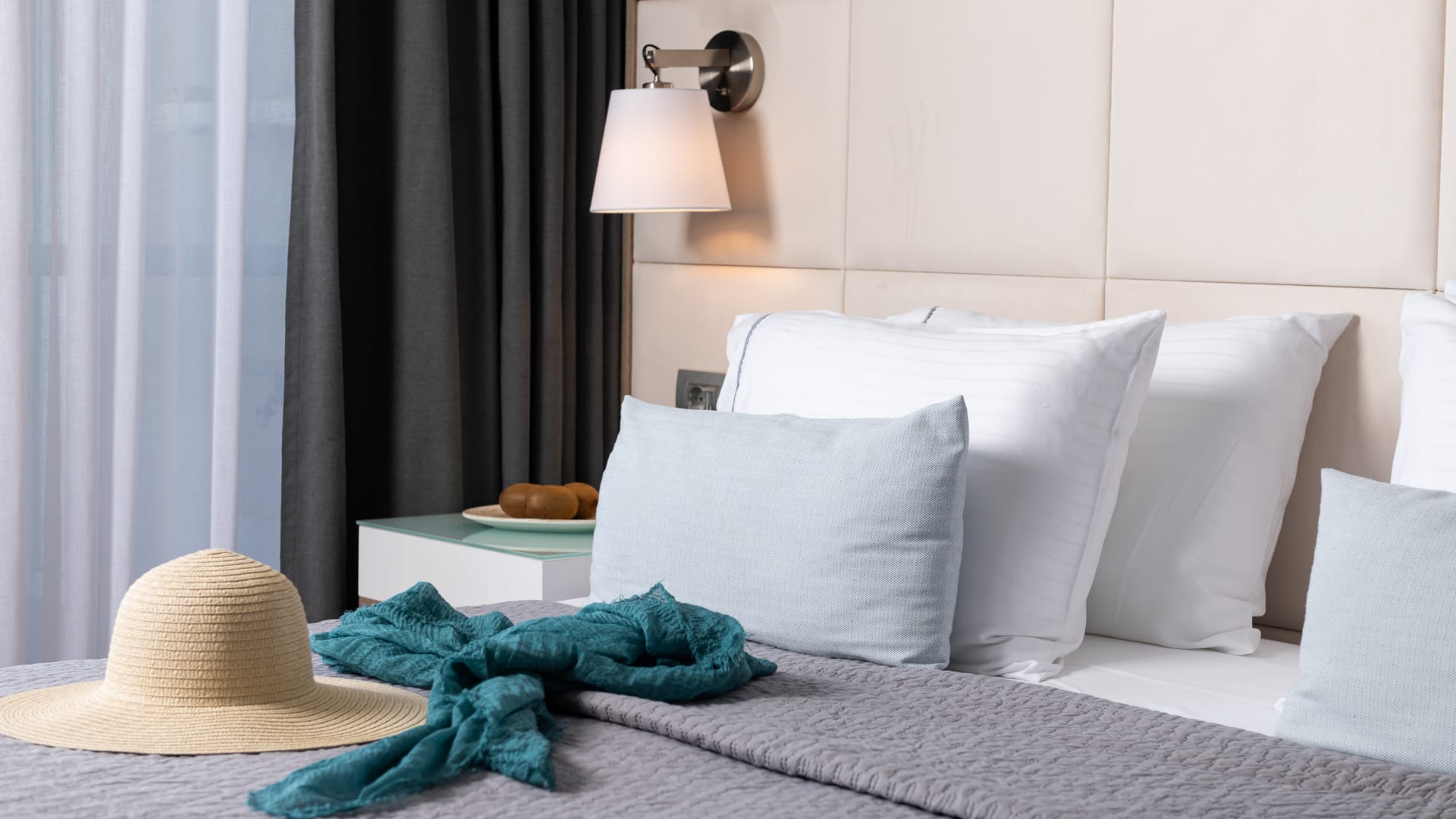 a bed with white pillows