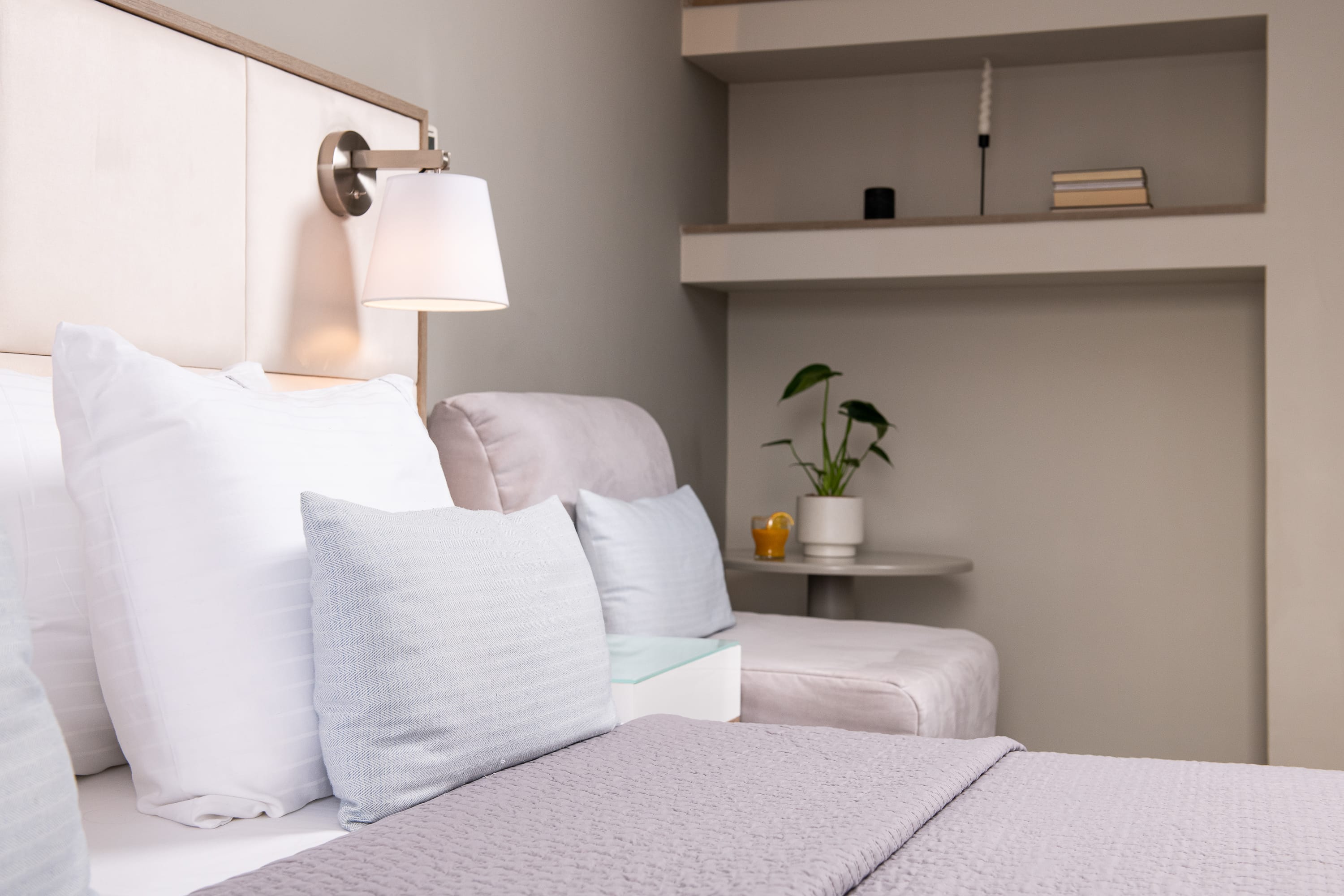 a bed with white pillows