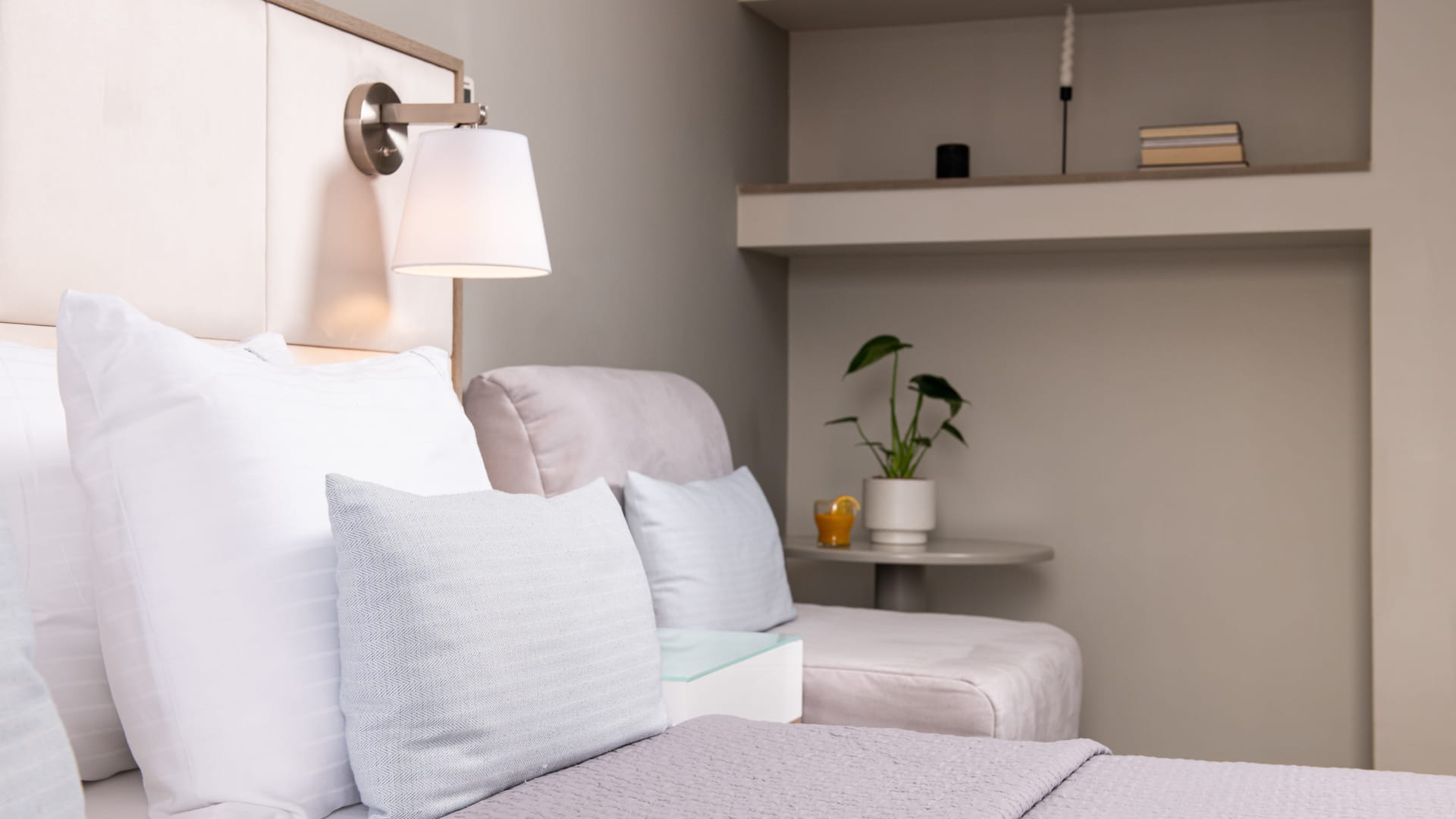 a bed with white pillows