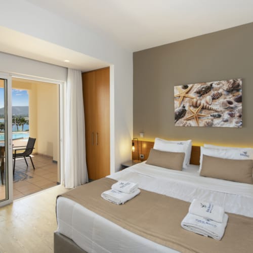 a hotel room with a large bed