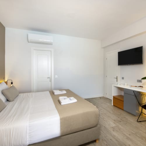 a living room with a couch and a tv