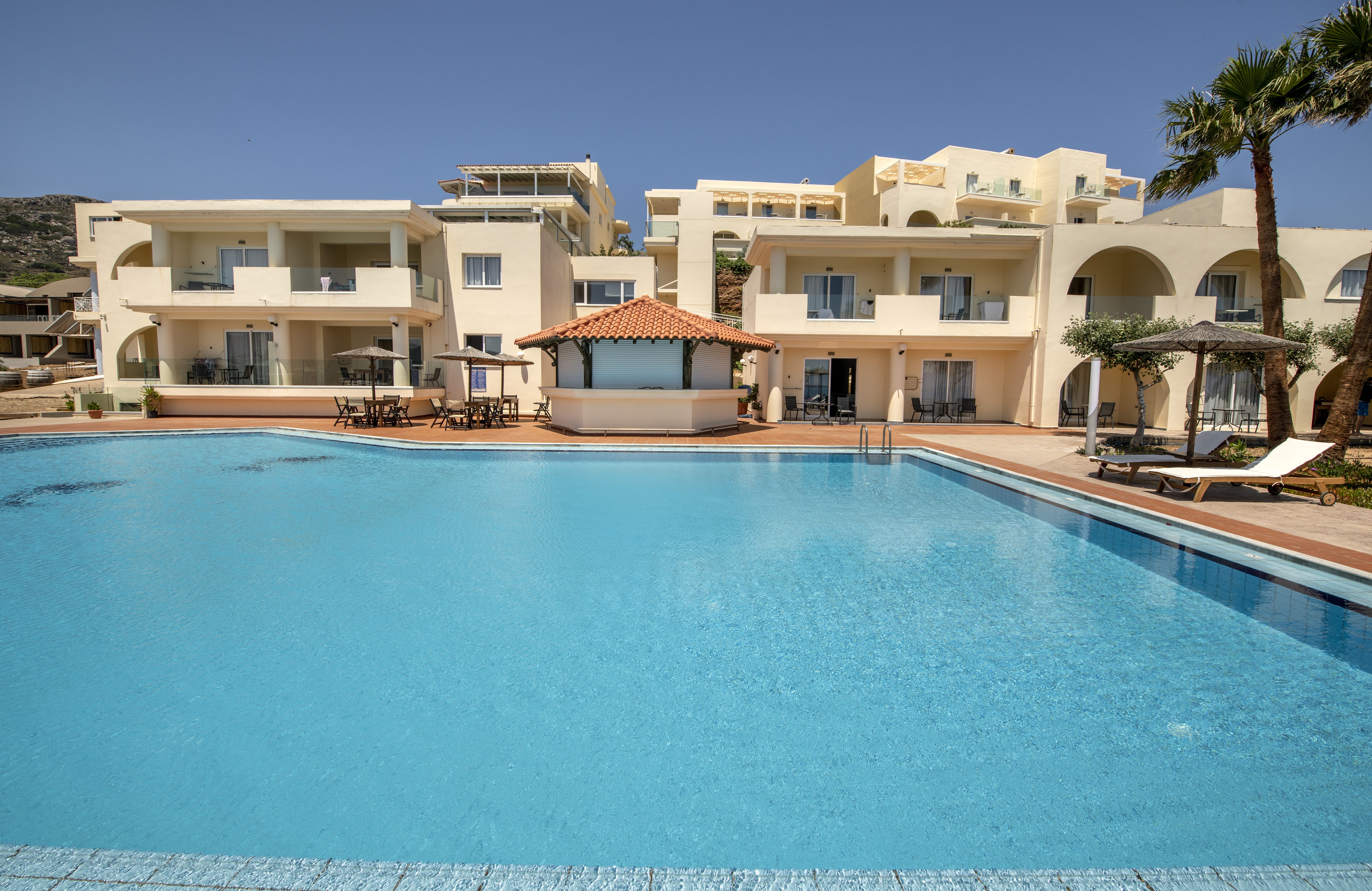 a large building with a pool