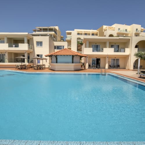a large building with a pool