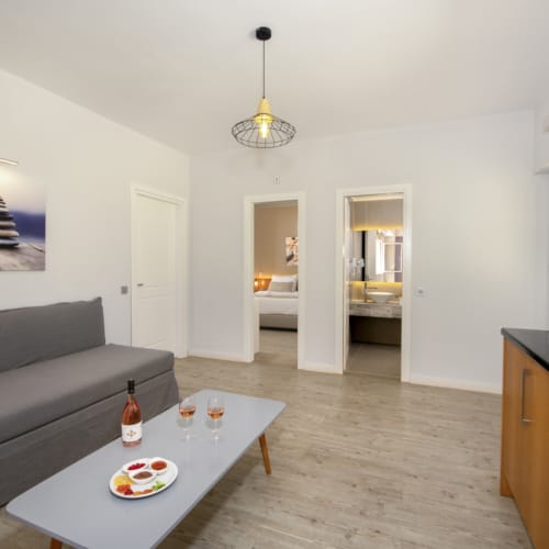 a living room with a couch and a table