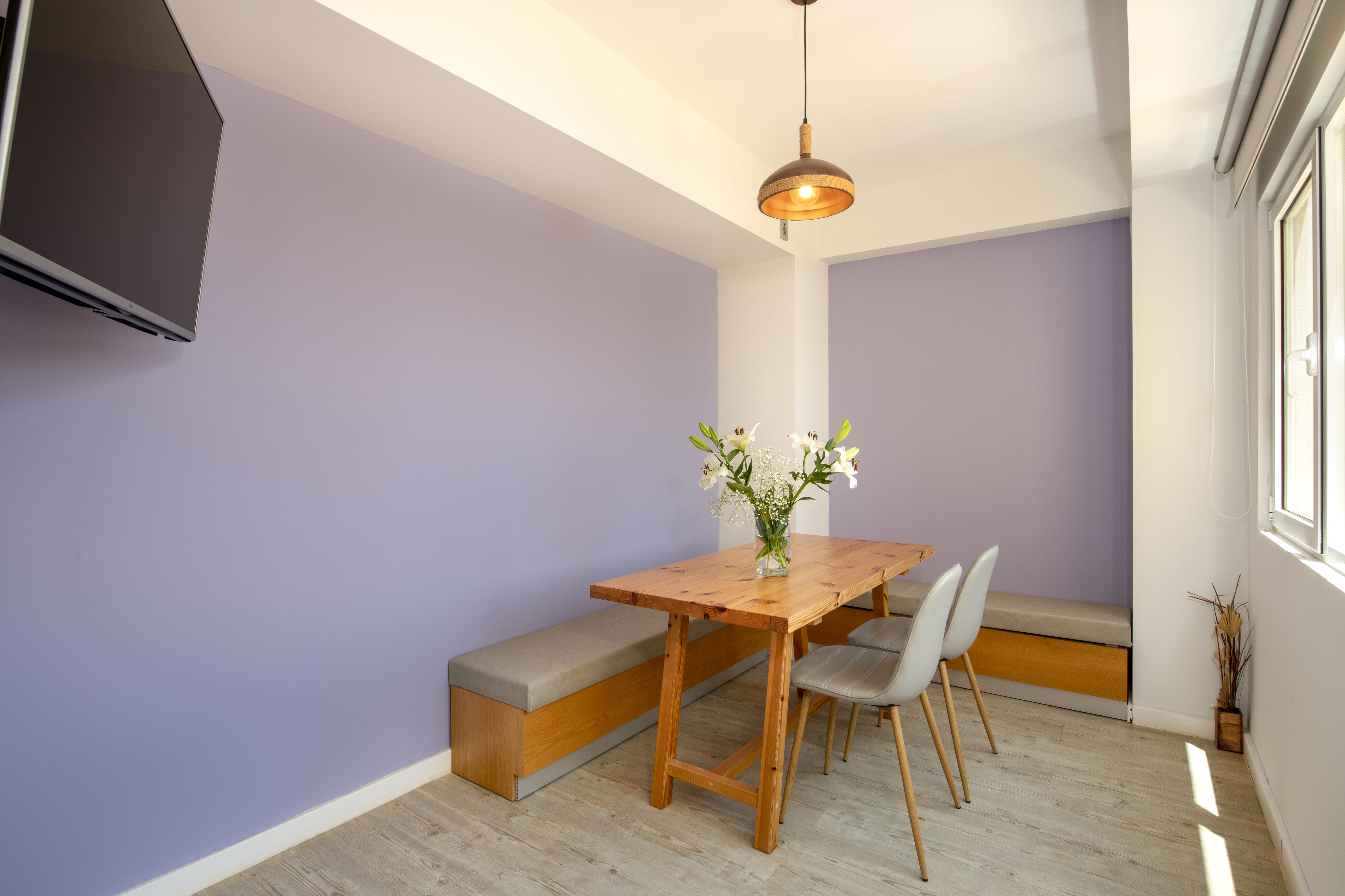a dining room table with chairs
