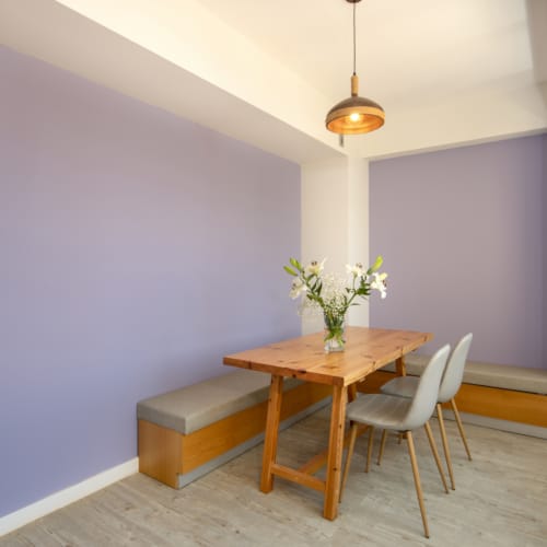 a dining room table with chairs