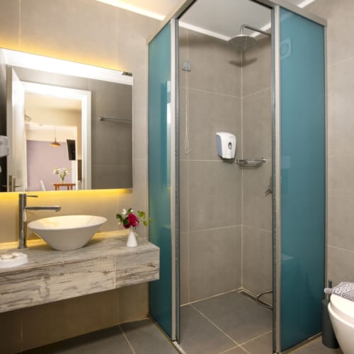 a bathroom with a glass shower